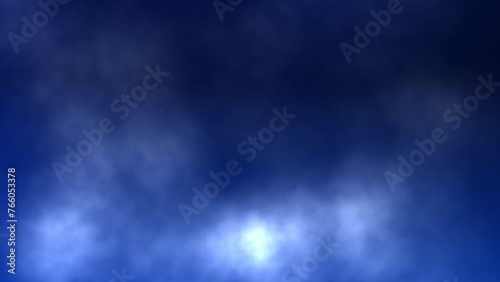 Smoke clouds moving slowly on a dark blue background.	
