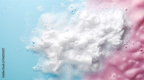 Washing foam stains on colorful background top view