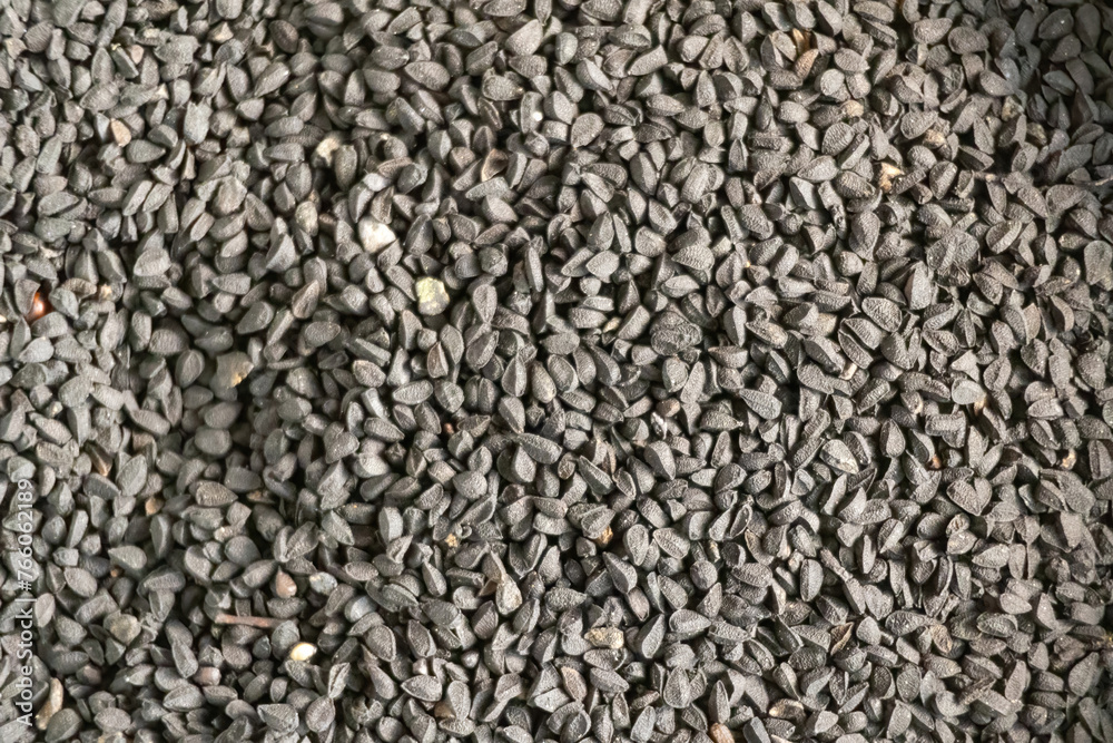 Black cumin (Nigella sativa) texture background. Locally in Bangladesh, it is called Kalojira and is also known as black caraway, black seed, fennel flower, black onion seed, and kalonji. Black cumin (Nigella sativa) texture background. Locally in Bangladesh, it is called Kalojira and is also known as black caraway, black seed, fennel flower, black onion seed, and kalonji.