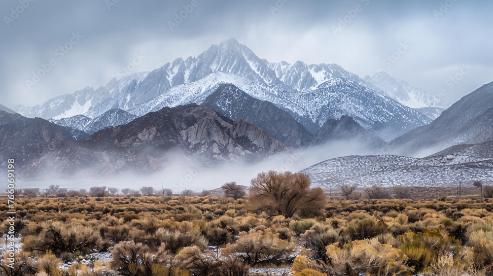 A snowy mountain landscape dissolving into a warm desert scene extremes in harmony