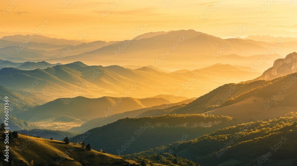 Obraz premium the tranquility of nature with a breathtaking landscape shot of a mountain range bathed in golden sunlight