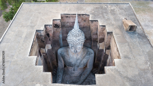 Wat Si Chum temple and big Buddha in Sukhothai historical park, Thailand photo