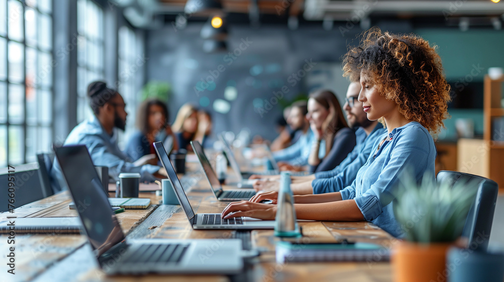 Group of business people and software developers working as a team in office. Group of business people and software developers working as a team in office.