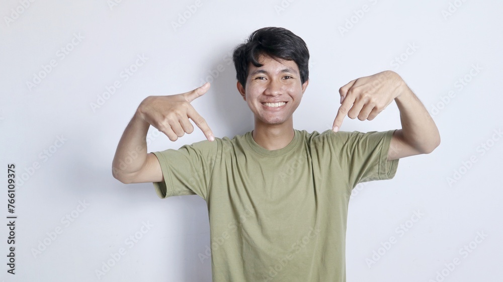 excited asian man pointing down excited asian man pointing down