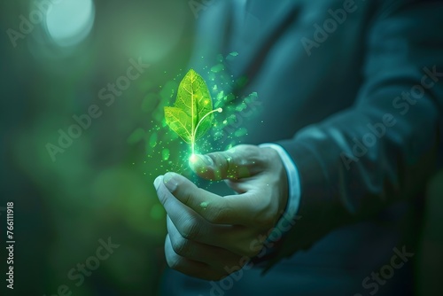 Businessman Illuminated by Glowing Green Leaf Promotes Eco-friendly Innovation