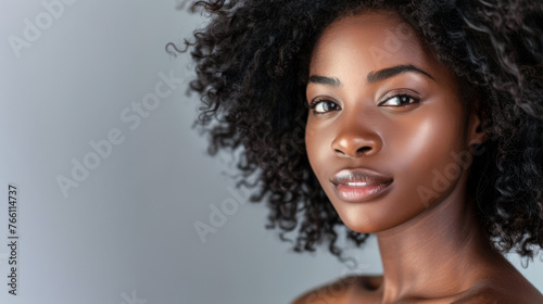 Diverse African woman portrait with a clean background for text