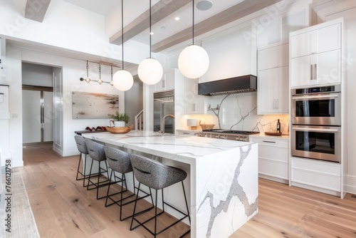 Modern Kitchen Interior With Marble Island, Pendant Lighting, and Stainless Steel Appliances