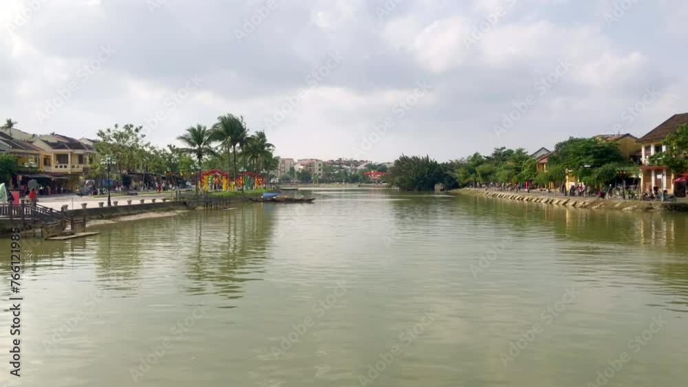 A view of the Thu Bon River during the day in Hoi An ancient town. UNESCO World Heritage site. Hoi An, Vietnam. A view of the Thu Bon River during the day in Hoi An ancient town. UNESCO World Heritage site. Hoi An, Vietnam.