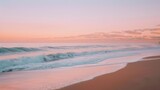 A peaceful sunset view of waves gently crashing on a pristine beach under a sky awash with pink and orange tones.