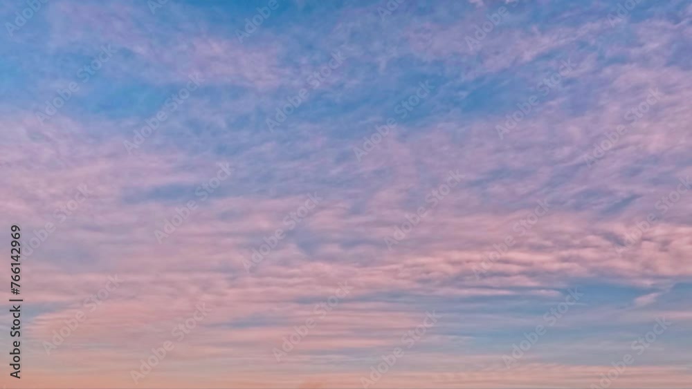 timelapse of the sky - violet sunset with overcast clouds - loop video