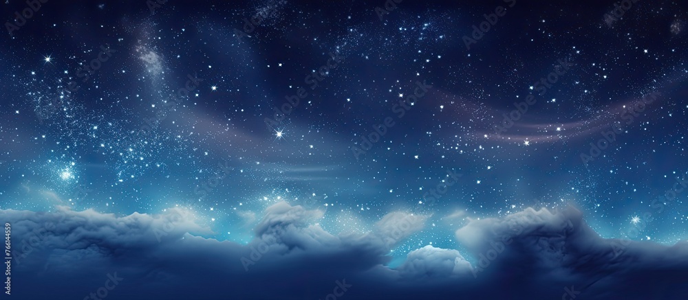 Naklejka premium The midnight sky painted with a vast array of stars, clouds, and a hint of aurora, creating a stunning natural landscape against the horizon