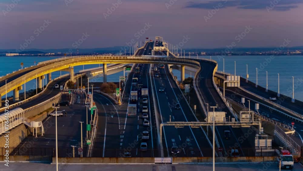 A dusk timelapse of traffic jam on the highway at Tokyo bay area in Chiba A dusk timelapse of traffic jam on the highway at Tokyo bay area in Chiba