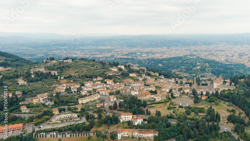 Florence, Italy. Fiesole is a city in the Tuscany region, in the province of Florence. The city of Florence in the background of the panorama, Aerial View