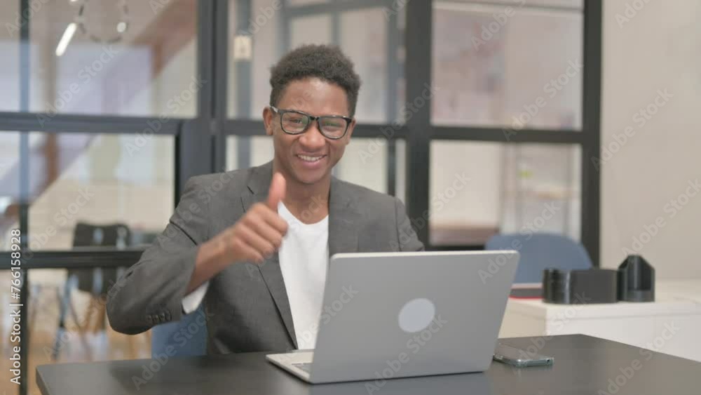 Thumbs Up by African American Man Using Laptop Thumbs Up by African American Man Using Laptop