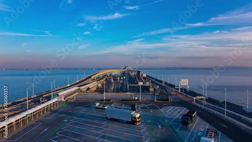 A dusk timelapse of traffic jam on the highway at Tokyo bay area in Chiba wide shot photo