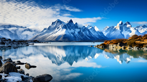 Reflection in Water: Unparalleled Natural Splendor of Imposing Mountains, Tranquil Lake, and Verdant Flora