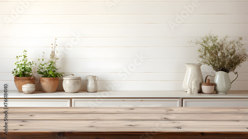 empty white wooden table in middle of kitchen background © Oleksandr