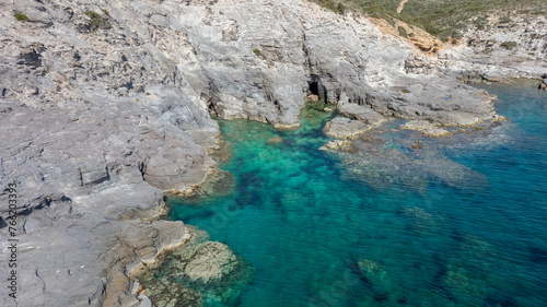 Wonderful view from above of the coast of Sardinia. "Cala della Signora" on a sunny summer day © Tommaso