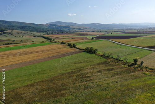 Aerial countryside view of agriculture fields, farmland, rural scenery by drone