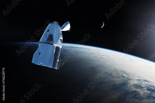 Fototapeta Naklejka Na Ścianę i Meble -  Cargo spacecraft in low-Earth orbit with sunlight. Elements of this image furnished by NASA.