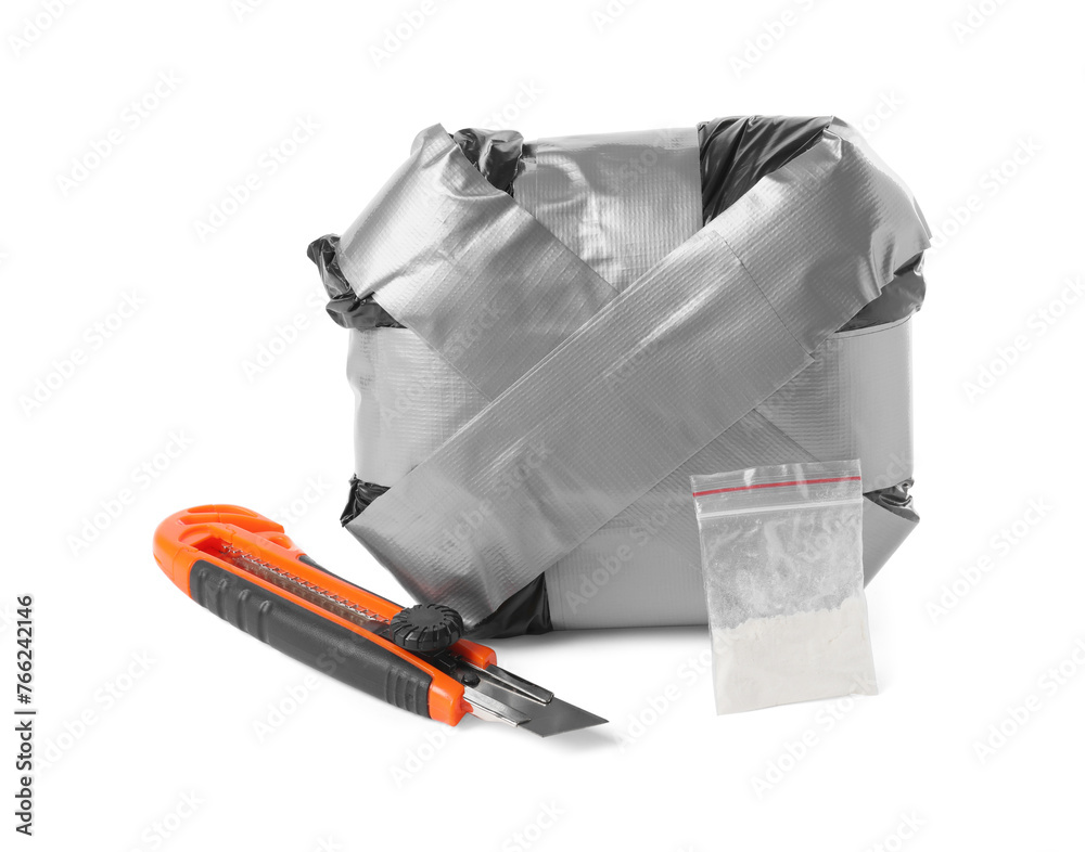 Packages with narcotics and stationery knife isolated on white - obrazy, fototapety, plakaty 