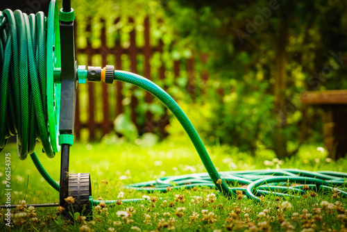 Garden hose for watering plants in garden