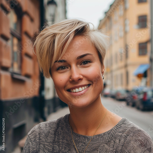 Portrait of beautiful blonde scandinavian woman model on the street of Stockholm 