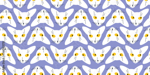 Seamless cat head pattern. Repeating texture with cute vector illustration of a abyssinian car. Elegant wrapping paper template. photo