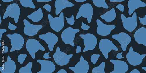 Seamless cat head pattern. Repeating texture with simple silhouette. Elegant wrapping paper template.