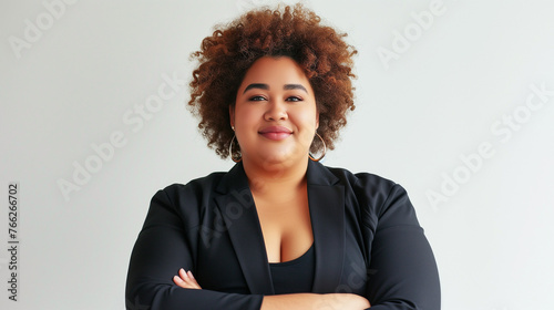 Beautiful Plus Size Latino Woman. Casual Office Clothes. Confident, Outgoing, Smiling. Successful Business Person, Educated Professional. Equality, Diversity at Work, International Company, Career. 