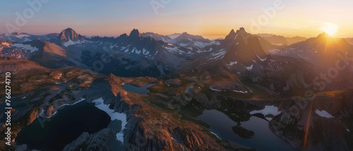 A panoramic view of the towering mountains and snowcapped peaks in Frenchman Lake