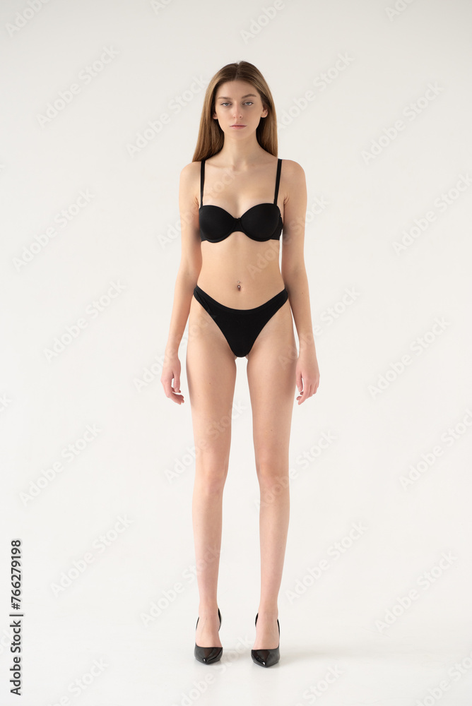 Fototapeta premium Snaps. Test Shots young model for modeling agency on a white background