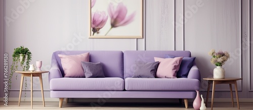A cozy living room with a vibrant purple couch and a beautiful painting hanging on the wall  showcasing thoughtful interior design choices