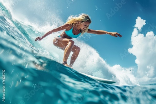Female enjoying summer fun Surfer riding a wave in the ocean