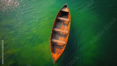 Small White Boat Floating on Lake