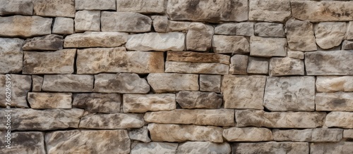 Capturing a detailed close-up of a stone wall showcasing a lone brick positioned prominently in the center