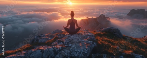 Yoga at dawn on a serene mountaintop © AlexCaelus