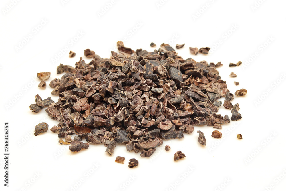 Pile of crushed cocoa beans nibs isolated on white background Pile of crushed cocoa beans nibs isolated on white background