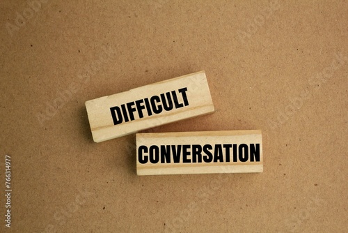 stick with the word DIFFICULT TO CONVERSATION. difficult conversation concepts photo