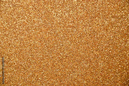 Processed collage of shiny golden glitter texture. Background for banner, backdrop or texture photo