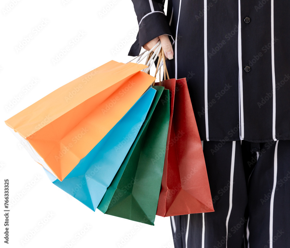 Beautiful girl holding shopping bags. Women are shopping In the summer she is using a credit card and enjoys shopping..