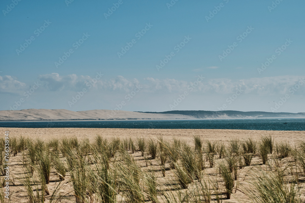 Dune du Pilat is the highest sand dune in Europe and is located at the Cote d Argent, the silver coast, at the atlantic ocean of France close to Arcachon and cap ferret. - obrazy, fototapety, plakaty 