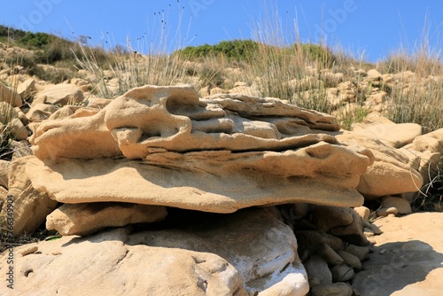 Lovely formed sandstone on the coast of Lopar on the island Rab, Croatia photo