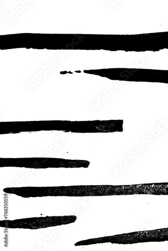 Abstract black and white brush strokes painted on white paper.background.