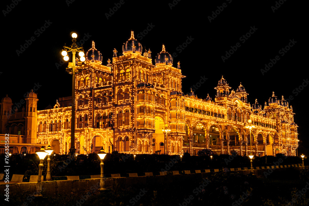 Spectacular Light illumination of Royal Mysore Palace is illuminated with 97000 electric bulbs on Sundays, national holidays & during ten days of Dasara Celebrations. Mysore, Karnataka, India.