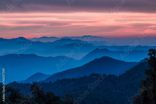 Sunset in the mountains. Dawn Majesty: High-Resolution Mountains with Soothing Natural Colors and Majestic Texture. Scenic views of Himalayan ranges of Kumaun region, Uttarakhand, India. 