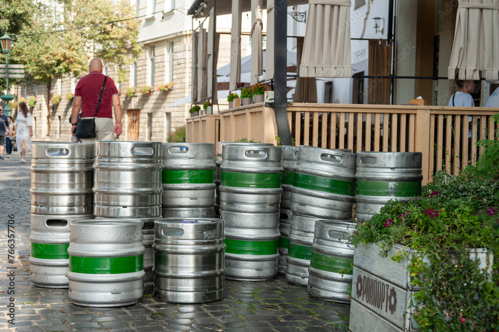 Beer barrels in the yard, a sign that fresh beer was brought to the roadside cafe Beer barrels in the yard, a sign that fresh beer was brought to the roadside cafe