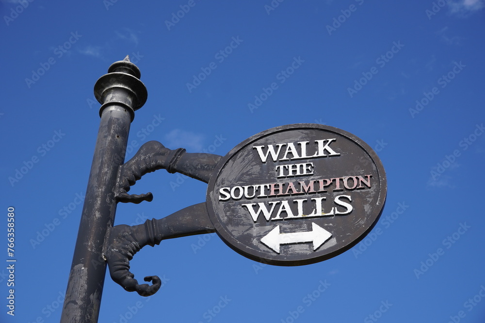 Walk the Southampton Walls tour sign in UK city. medieval fortification attraction in old town area of Southampton Walk the Southampton Walls tour sign in UK city. medieval fortification attraction in old town area of Southampton