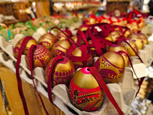 Traditional Easter market with red and gold easter eggs in Vienna