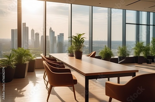 a working home office with a laptop on the table and a panoramic window overlooking the city